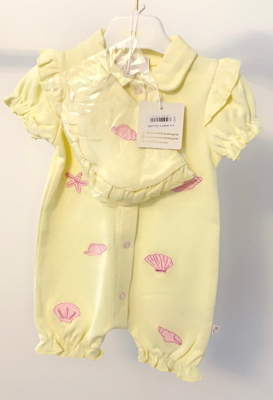 Baby girl caramelo shell romper with matching bib